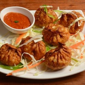 Fried Momos with a Spicy Tomato Chutney, 8 momos